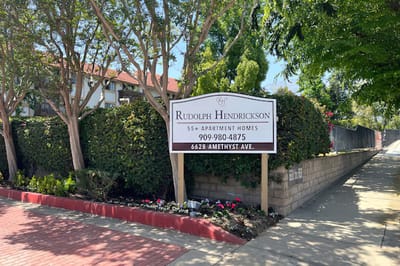 Exterior view of Rudolph Hendrickson Senior Apartments sign