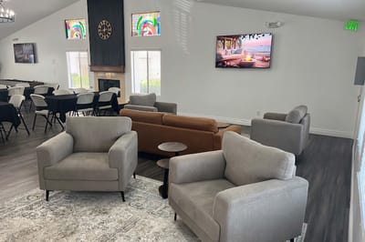 Welcoming common area with seating and dining setup