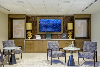 Modern lounge area with decorative elements and seating