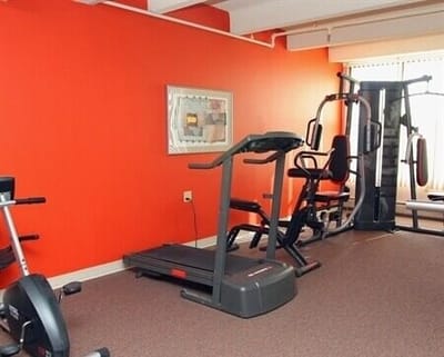 Interior view of a fitness area with exercise equipment