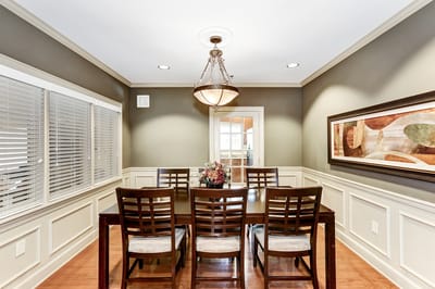 Dining room with a large table and artwork