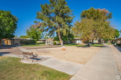 Outdoor courtyard with benches and trees