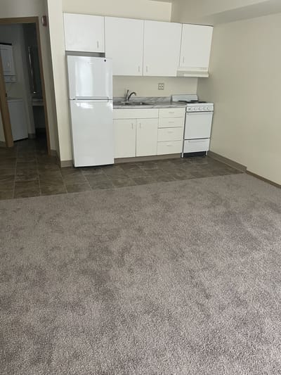 Interior view of a kitchen area in a senior living unit