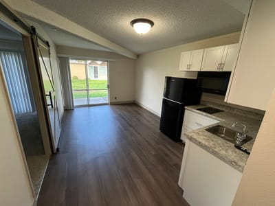 View of a cozy resident suite with kitchenette