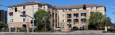 Exterior view of The Grove Senior Apartments building