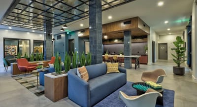 Bright and inviting common area with seating and decor