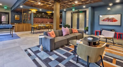 Modern common area with seating and decorative elements