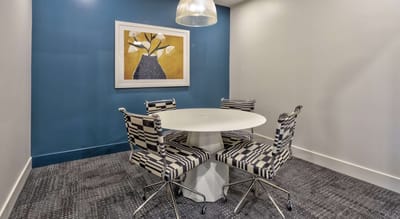 Brightly lit interior space with modern seating