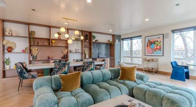 Bright common area with stylish seating and decor