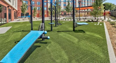 Outdoor fitness area with exercise equipment