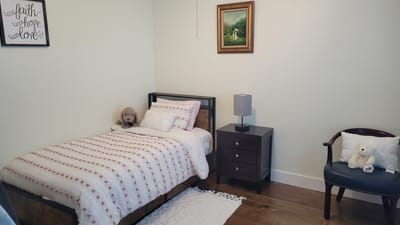 Cozy private resident room with a bed and decor