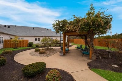 Outdoor garden space with seating and pathways