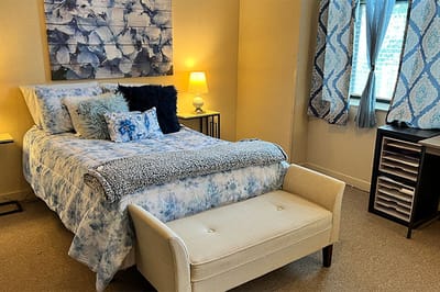 Cozy resident room with bed and decor