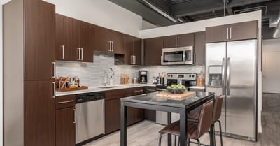 Modern kitchen interior with appliances and seating