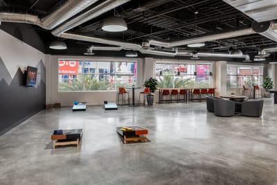 Bright, spacious common area with seating and recreational space.