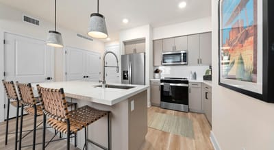 Modern kitchen interior with bar seating