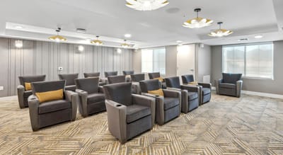 Interior activity room with seating and lighting