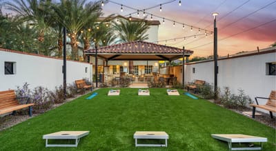 Outdoor space with seating and lawn area for activities