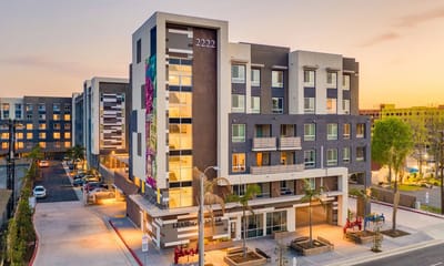 Modern assisted living facility building with exterior landscaping