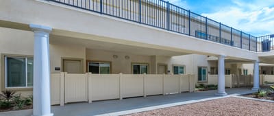 Exterior view of a senior apartment building entrance