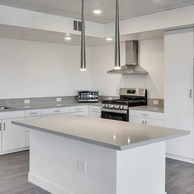 Modern kitchen with island and stainless steel appliances