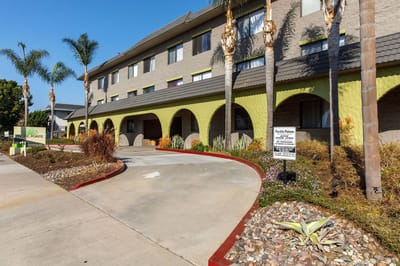 Front entrance of Pacific Pointe with landscaping