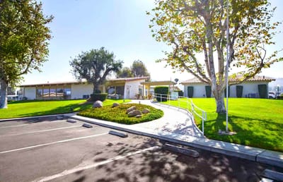 Exterior view of Mission Village with landscaped area