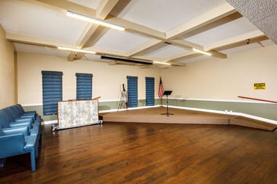 Interior common area with stage and seating