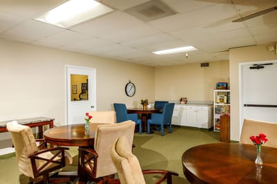 Interior view of a common area with dining tables