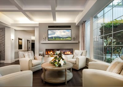 A welcoming common area with comfortable seating and large windows