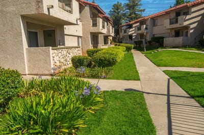 Well-maintained outdoor space with pathways and greenery