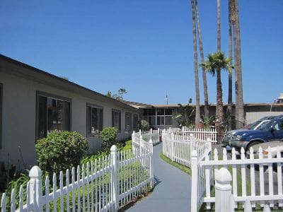 Exterior view of the facility's entrance and garden