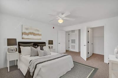 A well-furnished bedroom in a senior living apartment.