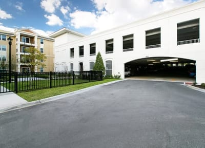 Exterior view of the facility with parking access.