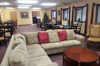 Cozy common area with seating and holiday decorations
