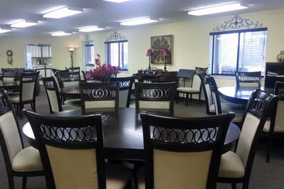 Interior dining area with tables and chairs