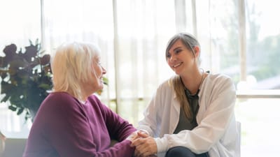 Healthcare professional interacting with a resident