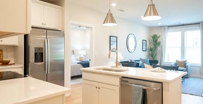 Modern interior living space with kitchen and sitting area