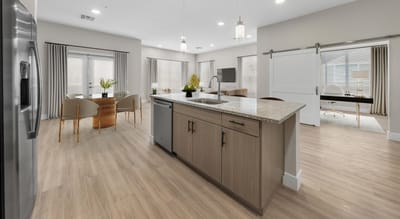 Bright and modern common area kitchen with seating