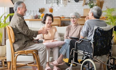 Residents enjoying a conversation in a common area