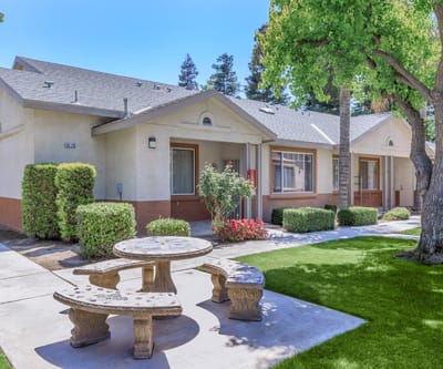 Outdoor view of Brookside Senior Apartments with landscaping