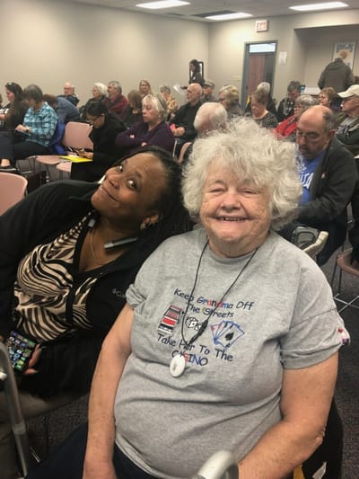 Residents enjoying an event in a common area