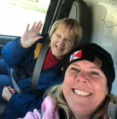 Two residents smiling for a selfie