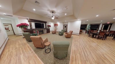 Bright common area with seating and festive decor