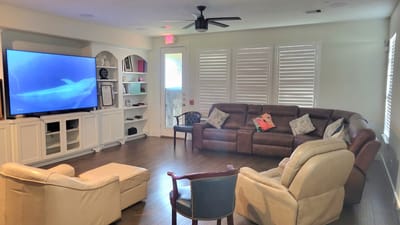 Cozy common area with seating and a TV