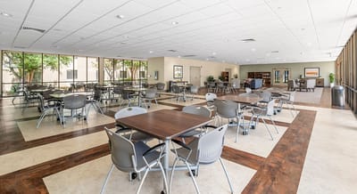 Bright dining room with tables and chairs