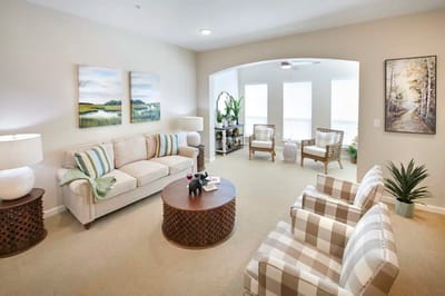 Bright common area with seating and artwork