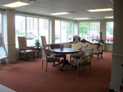 Lounge area with seating and large windows