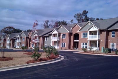 Exterior view of residential buildings in Chastain Manor Apartment
