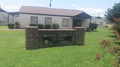 Exterior view of Bonita Terrace Apartments sign and building